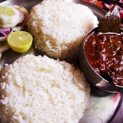 A picture of Ghooghni with boiled rice.