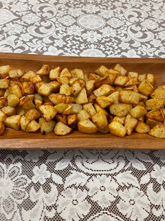 Una foto de Papas doradas al limón y especias en air fryer