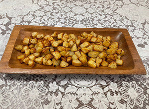 Una foto de Papas doradas al limón y especias en air fryer
