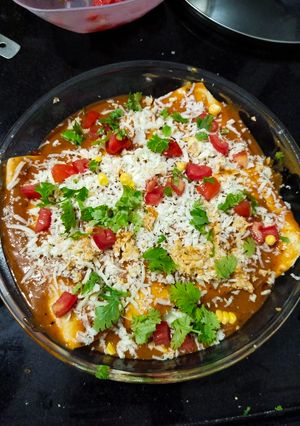A picture of Cheesy vegetable enchiladas.