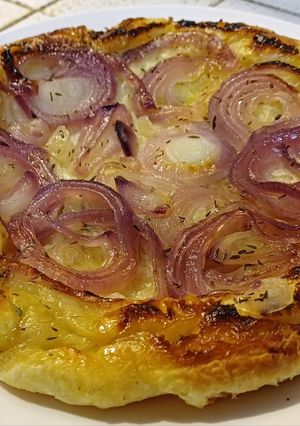 A picture of Upside-Down Savory Tart with Caramelized Onions.