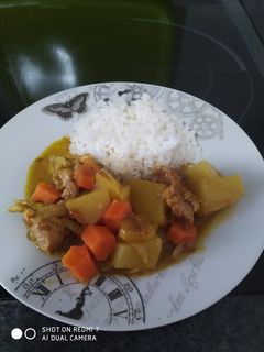 Una foto de Pollo al curry