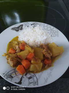 Una foto de Pollo al curry