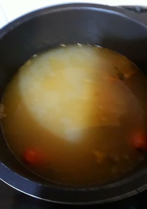 Una foto de Caldo de jamón serrano con verduras