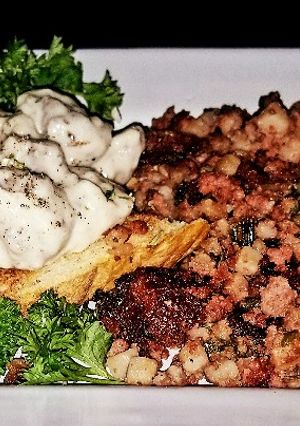A picture of Mike's Military SOS Gravy Thick Toast & Corn Beef Hash.