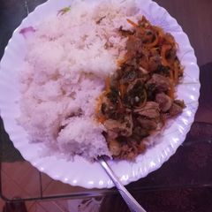 Boiled rice with beef stew A picture of Boiled rice with beef stew.