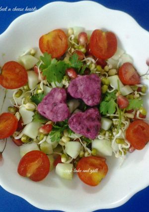 A picture of Salad with beet n cheese hearts.