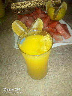 A picture of Orange and pineapple juice.