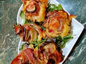 Una foto di melanze e scamorza prosciutto