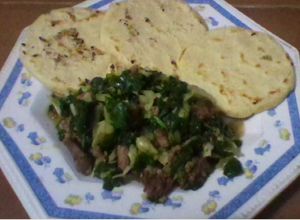 Una foto de Espinacas y col "repollo" en salsa de chimichurri