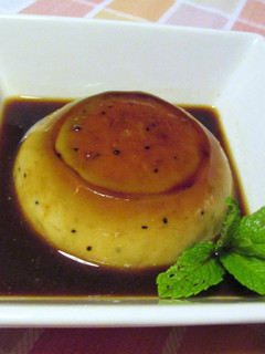 Una foto de Flan de kiwis con kirsch