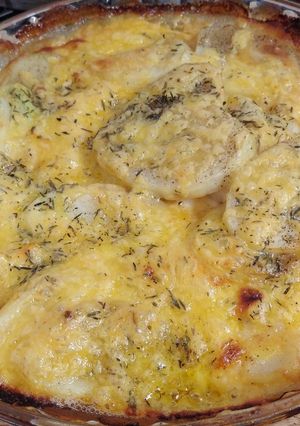 Una foto de Papas gratinadas con cebolla caramelizada 😋