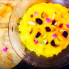 A picture of Mohanbhog with Luchi.