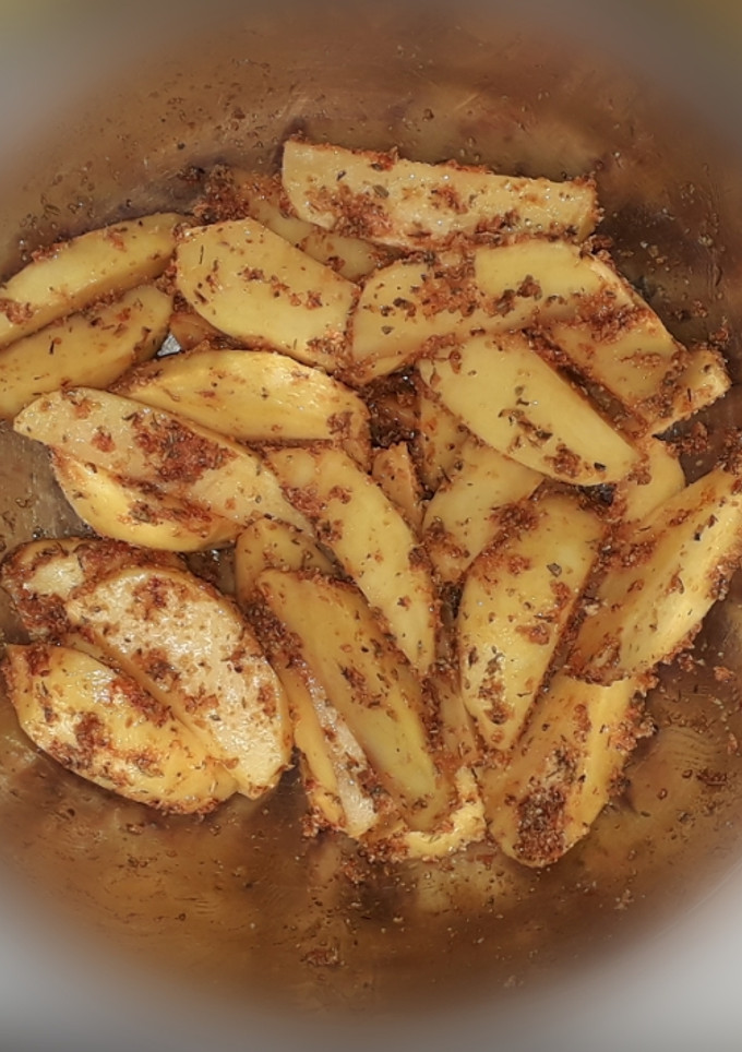 Una foto de Patatas Deluxe (patatas gajo al horno)