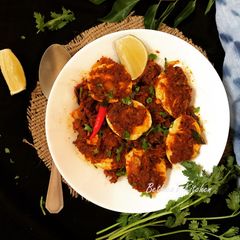 A picture of Guddu Ulli Karam (Egg Curry - Andhra style).