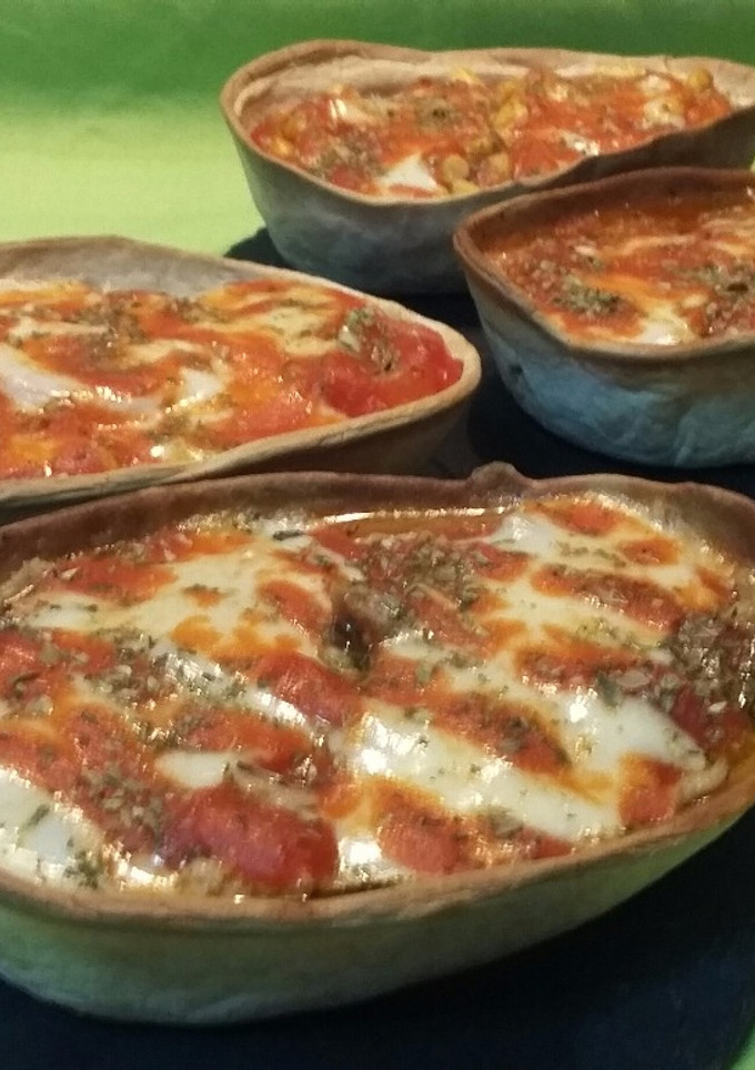 Una foto de Pizza en canastas