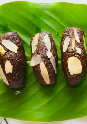 A picture of Jaggery & Cocoa Mithai & Pedha.