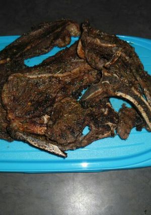 A picture of T bone with spicy herbs.