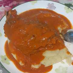 A picture of Fish in Coconut Milk with Mashed Potatoes.