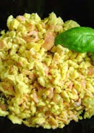 Una foto de Huevos Trufados en revuelto con Salmón Ahumado