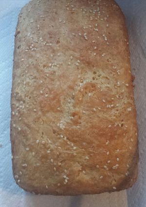 A picture of White bread w/ sesame seeds.