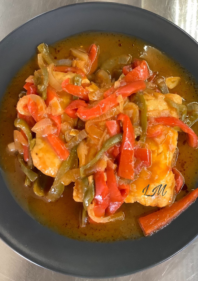 Una foto de Tronquitos de merluza con verduras