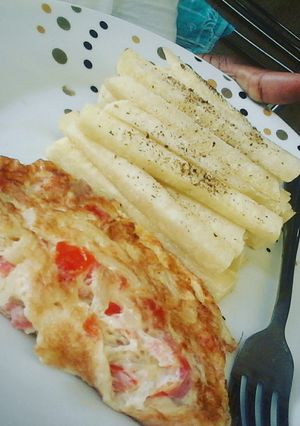 A picture of Baked Eggs with Yam Fingers.