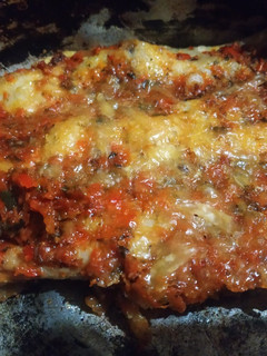 Una foto de Canelones de carne y salsa de morrón