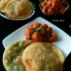 A picture of Koraishuti'r kochori,niramish notun aloo'r dum (Bengali style).