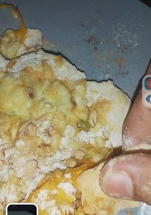 Una foto de Pizzería de ajo con mango y de queso con mango