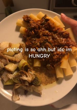 A picture of Stewed beef and rigatoni with white wine braised leeks.