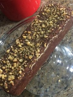 Una foto de Pastel de manzana con almendra y nueces