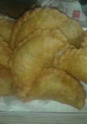 Una foto de Empanadas de cerdo cortadas a cuchillo