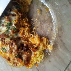 A picture of Noodles tikka pizza.