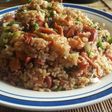Arroz chaufa casero mix de hot dog y cecina