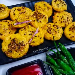 A picture of Kand Puri (Purple yam pakora).