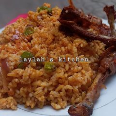 A picture of Left over rice into native Jollof rice 🤣🤣.