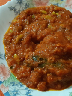 Una foto de Verdinas con tomate