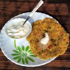 A picture of Methi muli pyaaz parantha in makai atta.