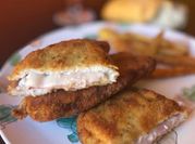 Una foto de libritos de lomo rellenos