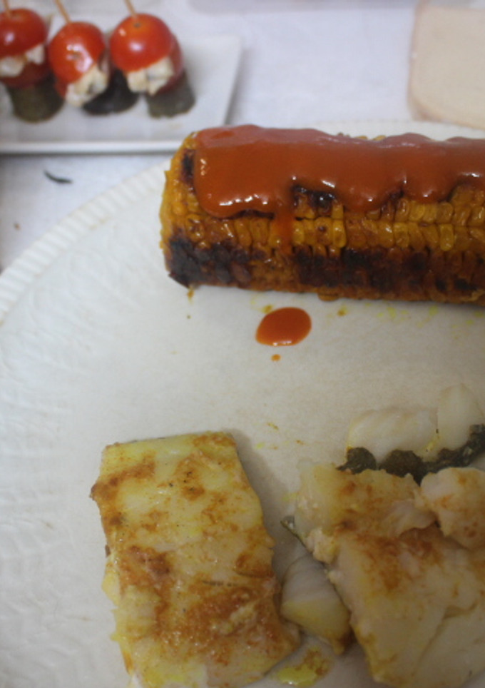 Una foto de Bacalao con maíz