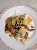 Spaghetti with Guanciale, Tuscan Kale Pesto, Pistachios, and Parmesan Crisps