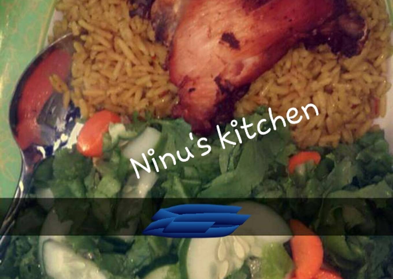 Jellof rice, fried chicken & simple lemon venaigrette dressing