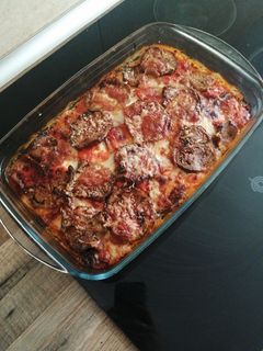 Una foto de Berenjenas a la parmesana