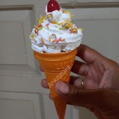 A picture of Cake in ice-cream cone.