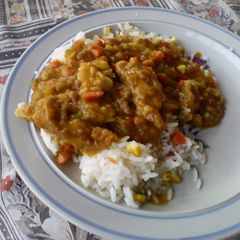 A picture of Fish curry with vegetables.