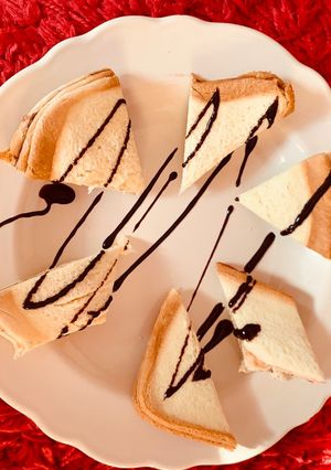 A picture of Nutella and jam bread mini sandwich.