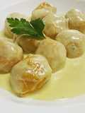 Ñoquis de boniato rellenos de bondiola con salsa roquefort