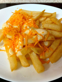 A picture of My Cheesy Sauce over Chips. 😘.