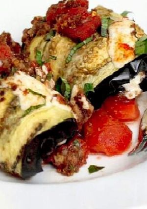 A picture of Rolled up brinjal with stuffings.